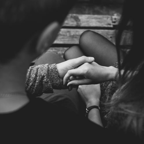 Close-up of Couple Holding Hands